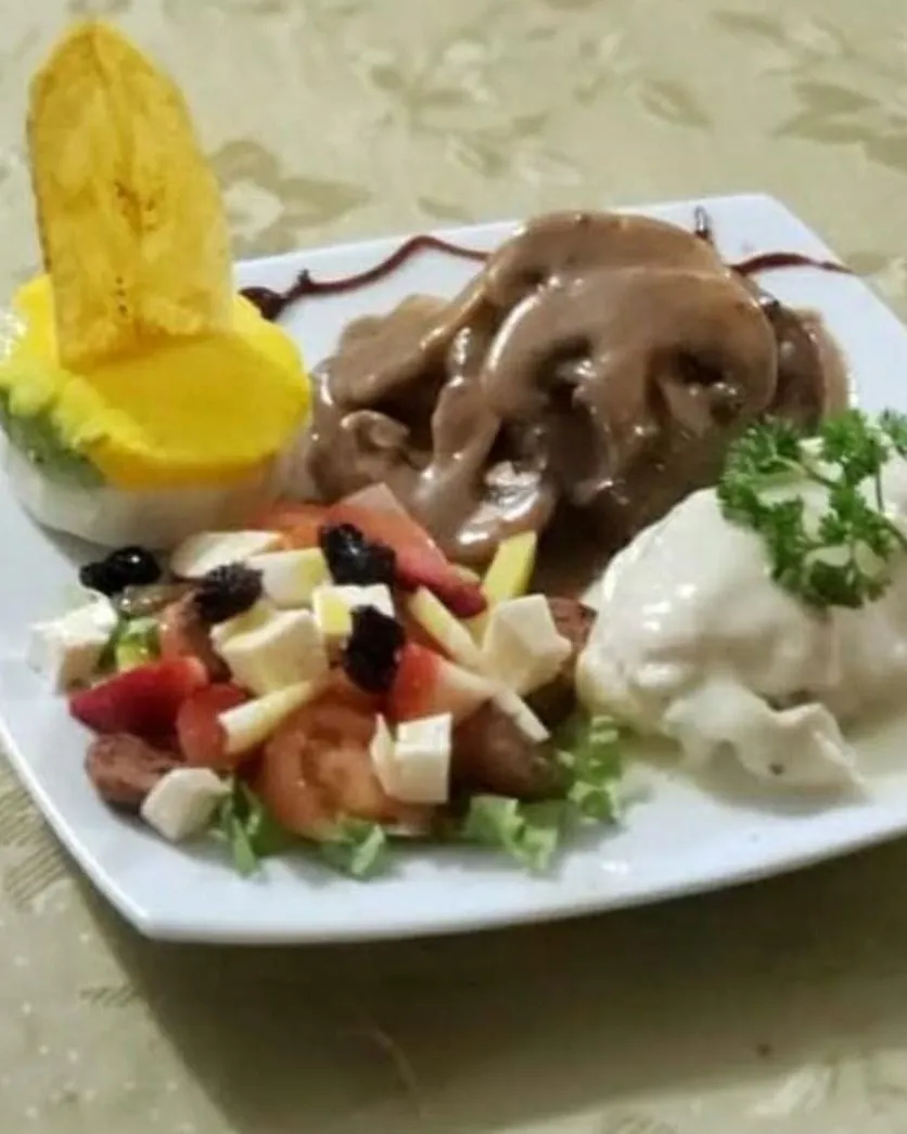 Res en salsa de champiñones